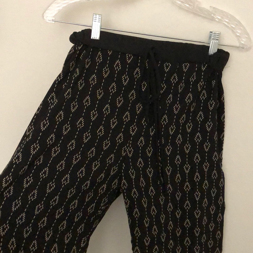 Black patterned flowy pants